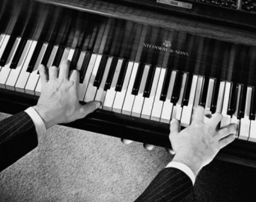 High angle view of a man's hands playing the piano Poster Print - Item # VARSAL25527488B