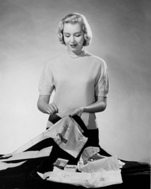 Studio shot of young woman sewing Poster Print - Item # VARSAL25542073