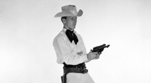 Side profile of a cowboy holding two pistols Poster Print - Item # VARSAL2558675