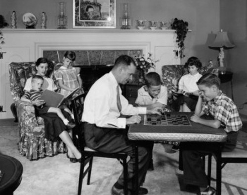 Parents and children sitting in living room Poster Print - Item # VARSAL2556562