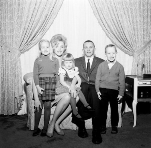 Portrait of family with children in living room Poster Print - Item # VARSAL255417646