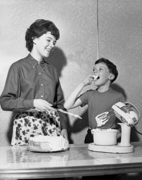 Mother preparing a cake with her son Poster Print - Item # VARSAL25514629