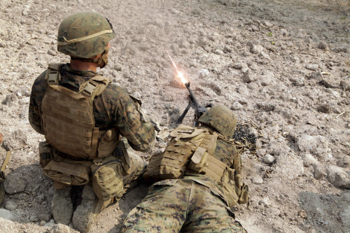 U.S. Marines provide suppressive fire on targets with an M240B machine gun during a Combined Arms Live Fire Exercise. Poster Print - Item # VARPSTSTK105283M