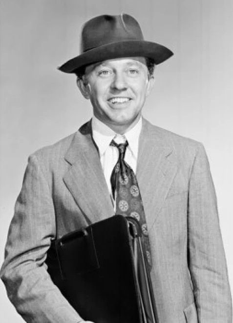 Portrait of a businessman holding a briefcase Poster Print