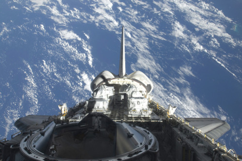 A partial view of Space Shuttle Atlantis backdropped by a blue and white Earth Poster Print - Item # VARPSTSTK203074S