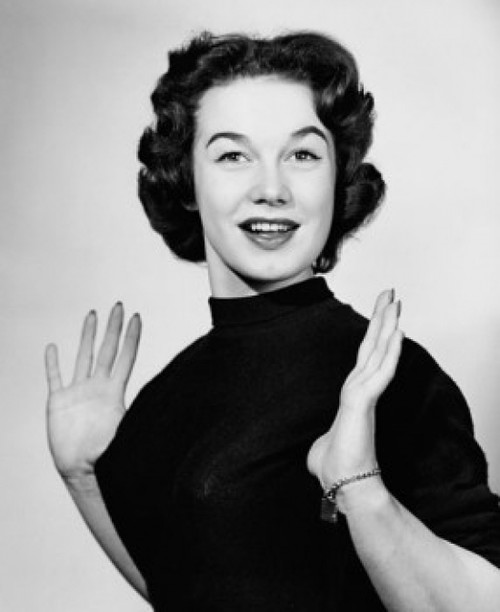 Portrait of a young woman smiling Poster Print - Item # VARSAL25510840