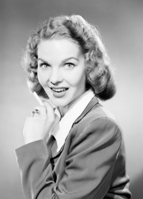 Studio portrait of young woman smoking cigarette Poster Print - Item # VARSAL255420271