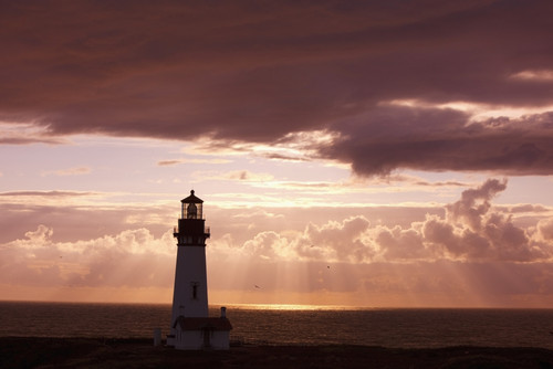 Oregon, United States Of America; Sunset Over Yaquina Head Lighthouse On The Oregon Coast PosterPrint - Item # VARDPI1876556