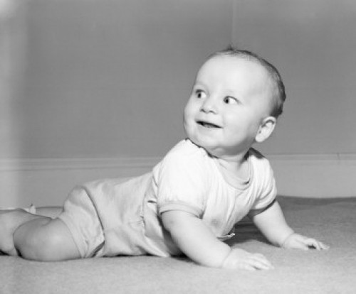 Baby boy crawling and smiling Poster Print - Item # VARSAL255416540