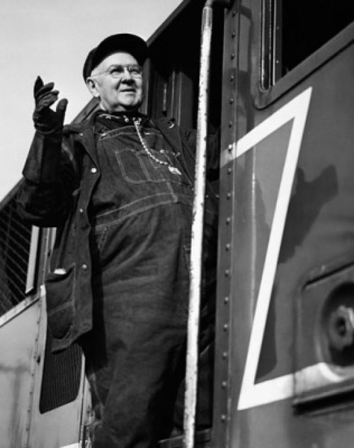 Low angle view of a locomotive engineer standing on a train Poster Print - Item # VARSAL25541204A