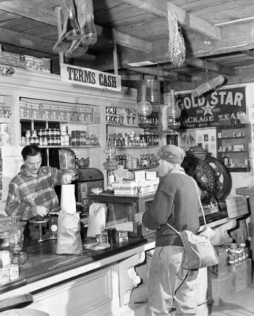 Senior man at the checkout counter of a store Poster Print - Item # VARSAL25543718