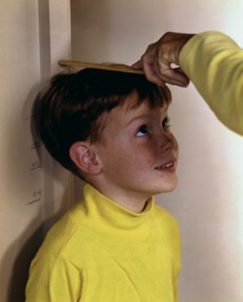 Boy being measured Poster Print - Item # VARSAL3811362281