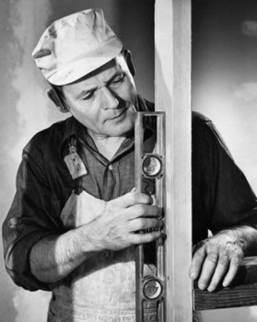 Close-up of a carpenter measuring a wooden plank Poster Print - Item # VARSAL2553579