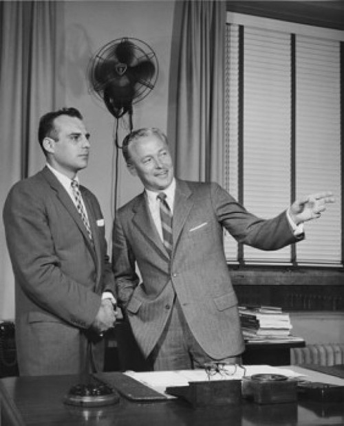 Two businessmen standing in office Poster Print - Item # VARSAL25547998