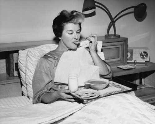 Mature woman reclining in the bed and eating soup Poster Print - Item # VARSAL25549024