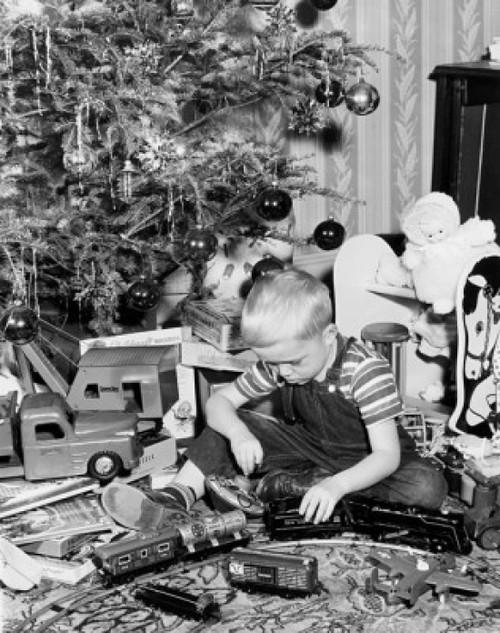 Boy playing with a toy train Poster Print - Item # VARSAL2554493