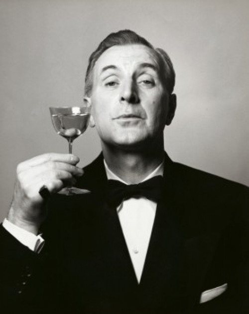 Portrait of a mature man holding a martini glass Poster Print - Item # VARSAL2553760