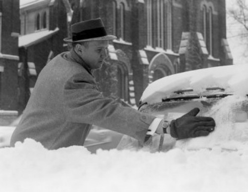 Man cleaning car of snow Poster Print - Item # VARSAL255421908