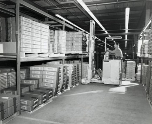 Side profile of a worker operating a forklift in a warehouse Poster Print - Item # VARSAL25539572