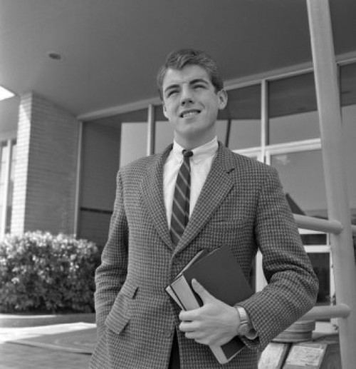 Student holding books Poster Print - Item # VARSAL255418148