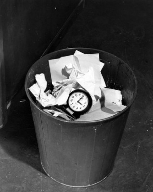 Wastebasket with paper and clock inside Poster Print - Item # VARSAL25549523