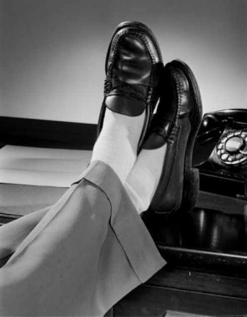 Men's feet on desk Poster Print - Item # VARSAL255421235