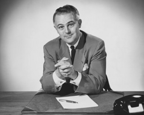 Portrait of a businessman sitting in an office Poster Print - Item # VARSAL2553112