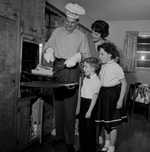 Parents with kids cooking food Poster Print - Item # VARSAL255422681