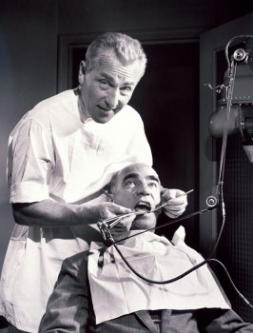 Nervous male patient getting treatment from a male dentist Poster Print - Item # VARSAL2557001