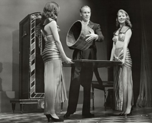 Magician showing an empty bucket Poster Print - Item # VARSAL25538089