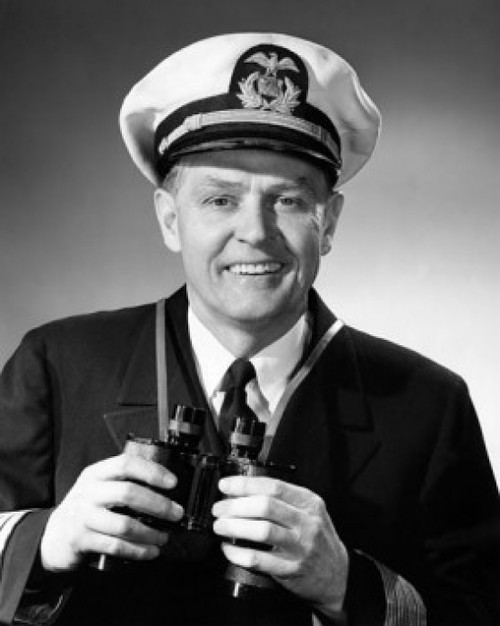 Portrait of a captain holding a pair of binoculars and smiling Poster Print - Item # VARSAL25544158