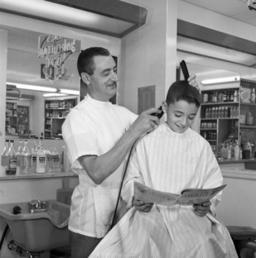 Barber shaving boy's head Poster Print - Item # VARSAL255418031