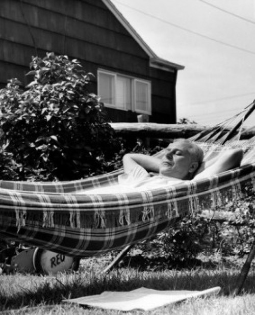 Man relaxing in hammock Poster Print - Item # VARSAL25549066