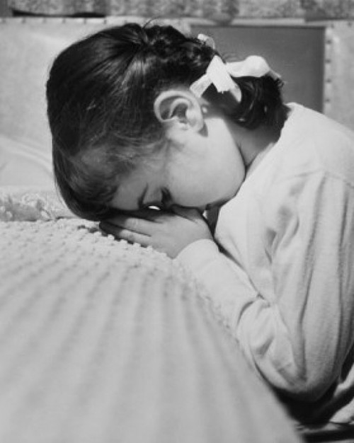 Side profile of a girl praying at bedtime Poster Print - Item # VARSAL2553246