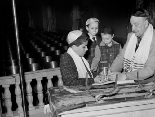 Man with boys praying in synagogue Poster Print - Item # VARSAL255422131