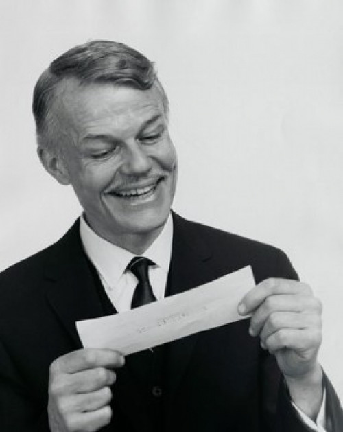 Close-up of a businessman looking at a check Poster Print - Item # VARSAL25534206