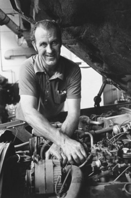 Auto mechanic repairing a car Poster Print - Item # VARSAL25540442