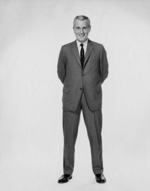 Portrait of businessman smiling with his hands behind back Poster Print - Item # VARSAL2555363