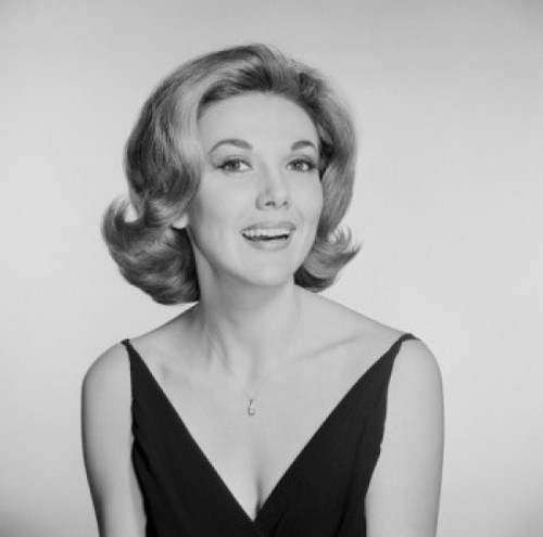 Studio portrait of woman smiling Poster Print