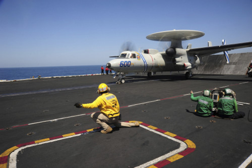 An E-2C Hawkeye launches from the flight deck of USS Dwight D. Eisenhower Poster Print - Item # VARPSTSTK106963M
