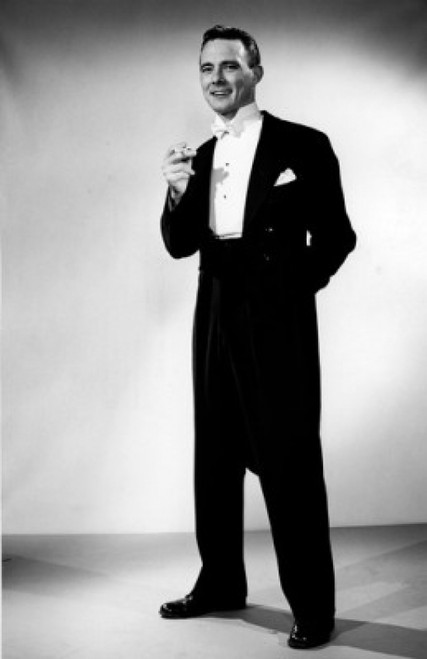 Elegant young man holding cigarette  studio shot Poster Print