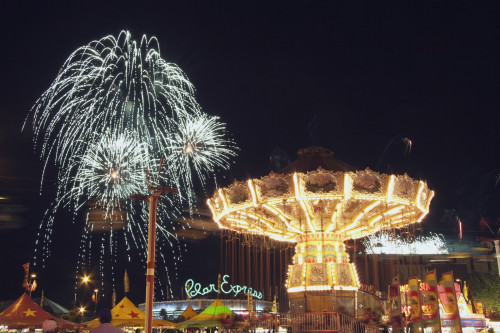 Calgary, Alberta, Canada; Midway Rides At Night With Fireworks At The Calgary Stampede PosterPrint - Item # VARDPI1866864
