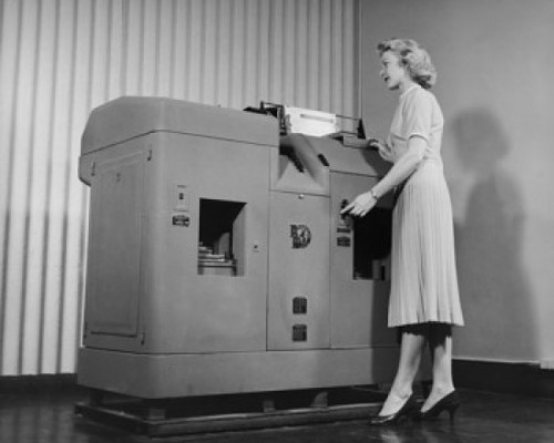 Side profile of a secretary working on a tabulating and accounting system Poster Print - Item # VARSAL2551347