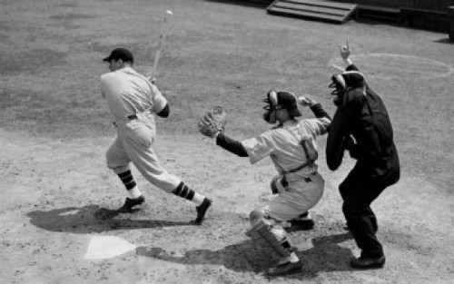 Baseball player swinging a baseball bat with a baseball catcher and a baseball umpire standing beside him Poster Print - Item # VARSAL2558585