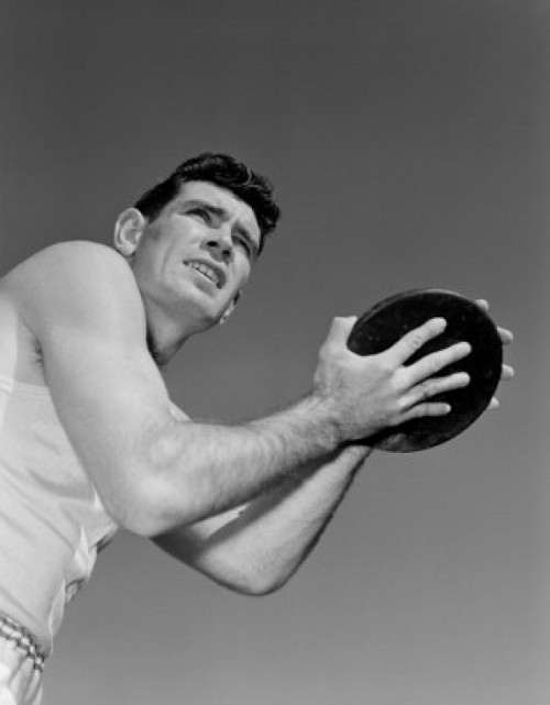 Man holding plastic disc Poster Print - Item # VARSAL255417078