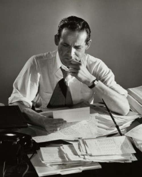 High angle view of a businessman reading documents in an office Poster Print - Item # VARSAL2553101