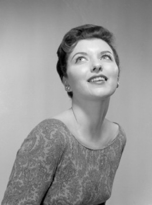Young woman smiling  looking up Poster Print - Item # VARSAL255417636