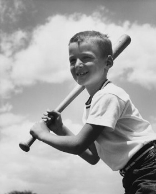 Low angle view of a boy swinging a baseball bat Poster Print - Item # VARSAL25512900