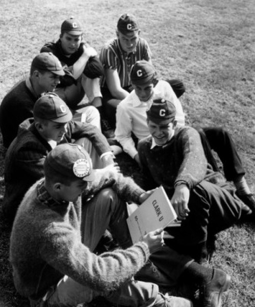 High angle view of young men sitting on a lawn Poster Print - Item # VARSAL2557160