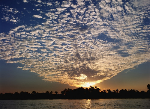 Clouds And Sky At Sunset Over The Nile River PosterPrint - Item # VARDPI1880438